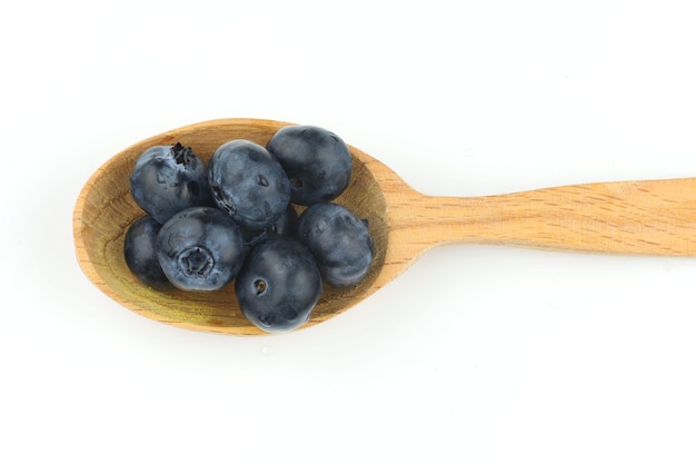 Blueberry in a spoon isolates