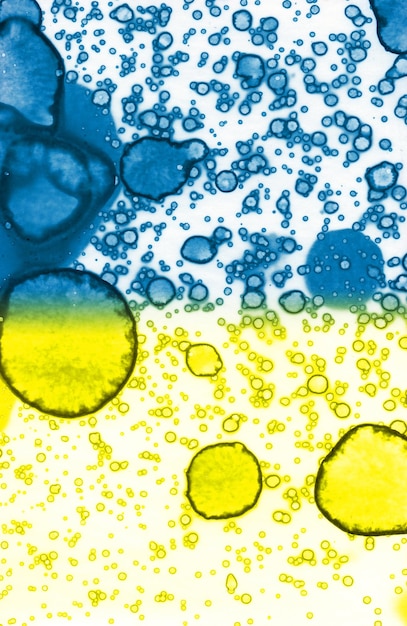 Blueyellow texture Abstraction from stains Smoke and bubbles Trendy background