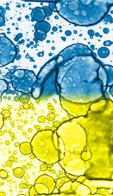 Blueyellow texture Abstraction from stains Smoke and bubbles Trendy background