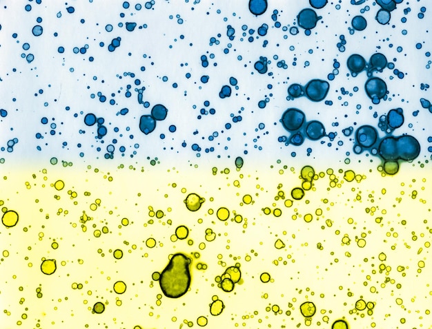 Blueyellow texture Abstraction from stains Smoke and bubbles Trendy background