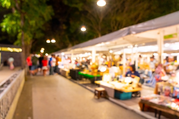 Blur scene at night street market