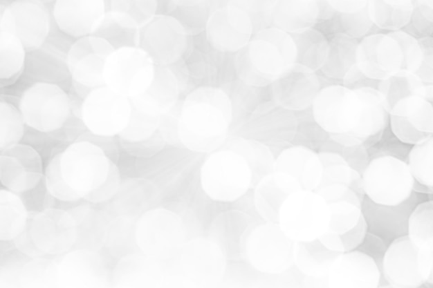 Blurred abstract background Abstract white and silver blurred background with glittering lights for display white bokeh abstract background