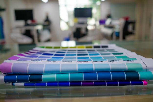 A blurred background photo of the inside of printing sublimation room Color Palette Guide