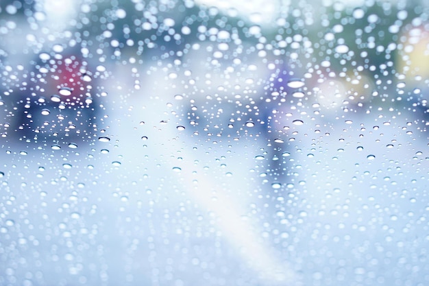 Blurred background of raindrops on the car windshield