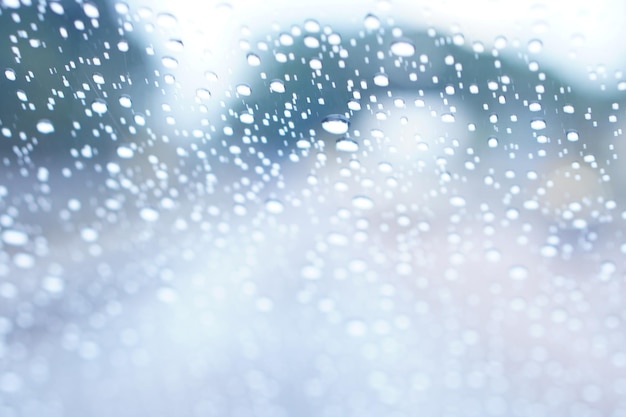 Blurred background of raindrops on the car windshield