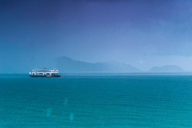 Blurred of the boat float in the sea