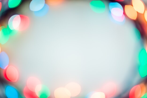 Blurred bokeh christmas lights in warm tone background