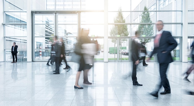 Blurred business people at a corridor