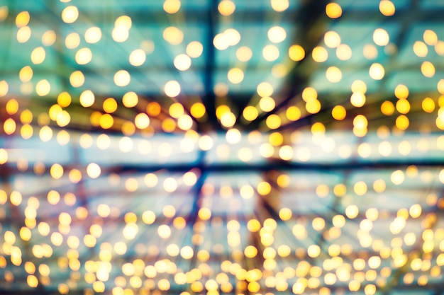 Blurred colorful bokeh with glittering shine lights background