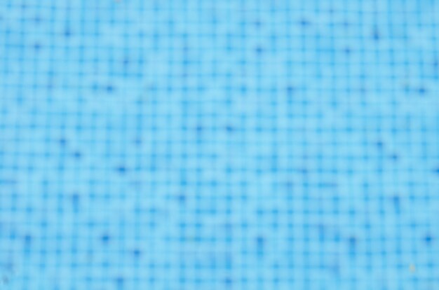 Photo blurred distortion of tiles in swimming pool