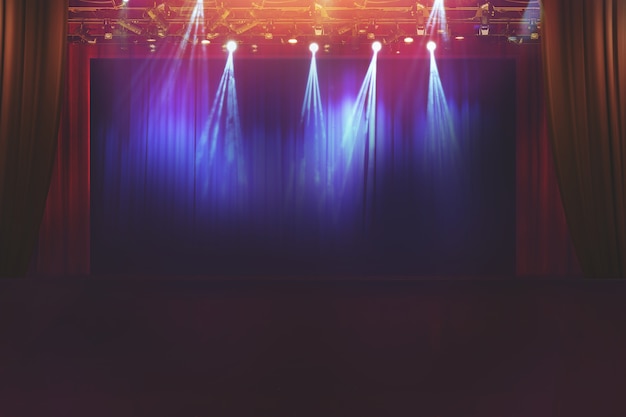 Blurred empty theater stage with fun colourful spotlights, abstract image of concert lighting