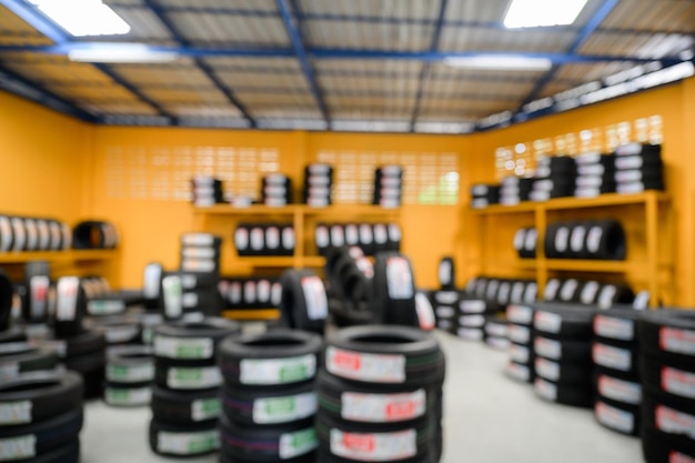 Blurred image of the new tire storage room In the abundance of stock change tires at any workshop or auto repair shop Tire warehouse for the automobile industry