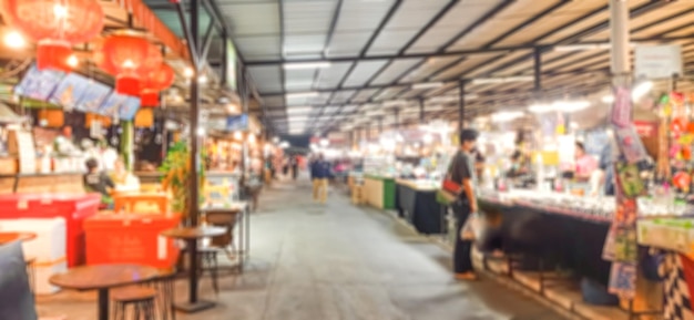 Blurred image of street food market with bokeh for background