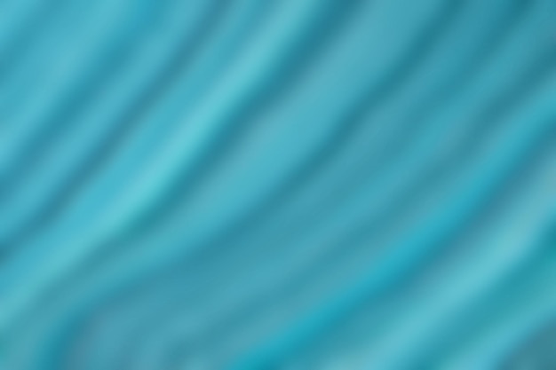 Blurred light blue and turquoise background with wavy curly pattern Defocused art abstract gradient backdrop