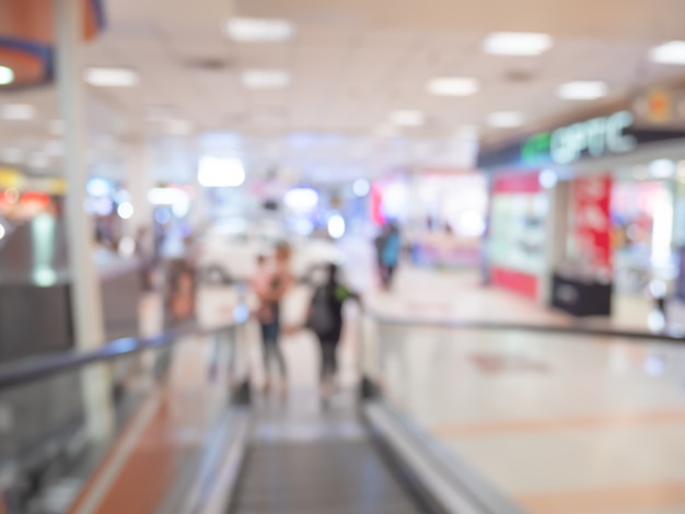 Blurred people in shopping mall abstract background