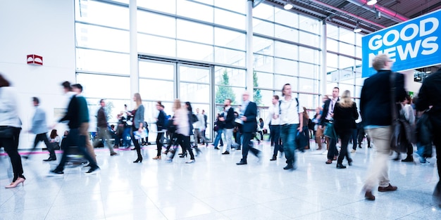 Blurred people at a trade fair