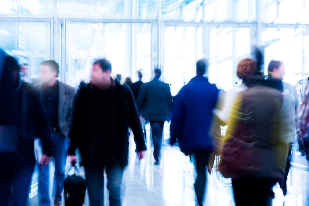 Blurred people at a trade fair