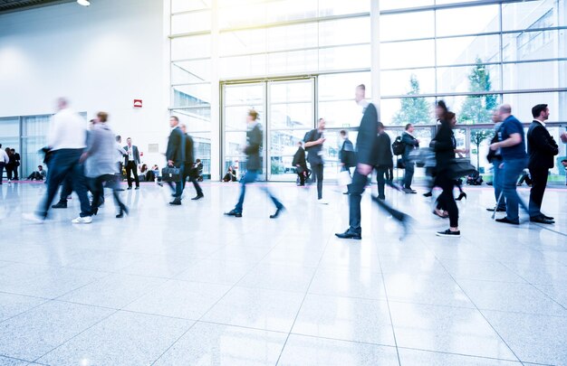 Blurred people at a trade fair