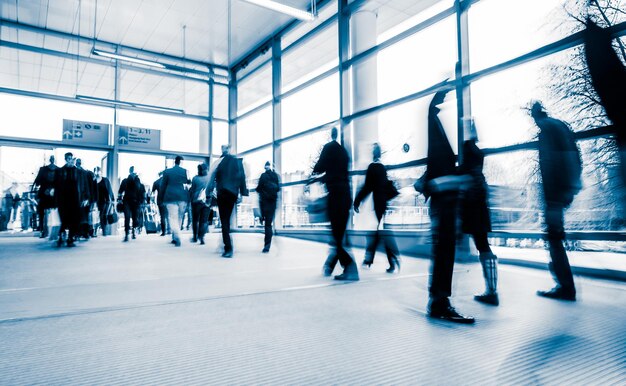 Blurred people at a trade fair