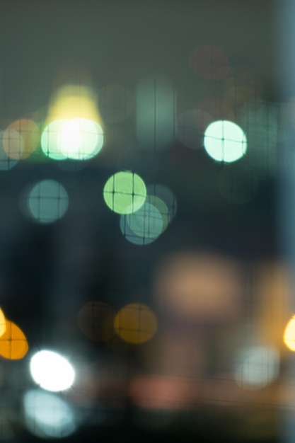 Blurred scene of colorful bokeh building and net background at night