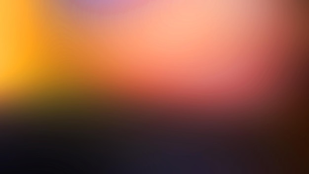 A blurry image of a colorful background with a blurry background.