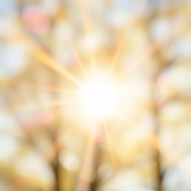 Photo a blurry image of a sun shining through a tree