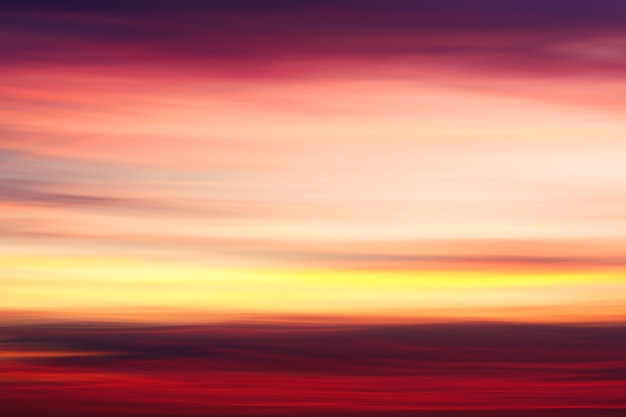 Blurry mystic sunset clouds shooted with camera motion as creative abstract background