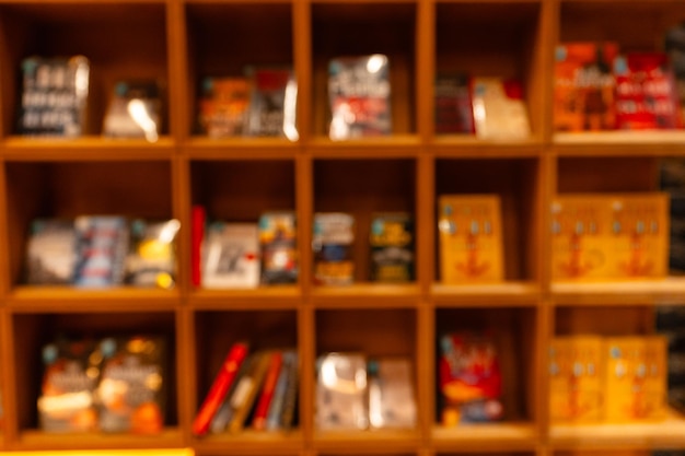 Photo blurry room with bookshelves by defocused effect use for background or backdrop in busin