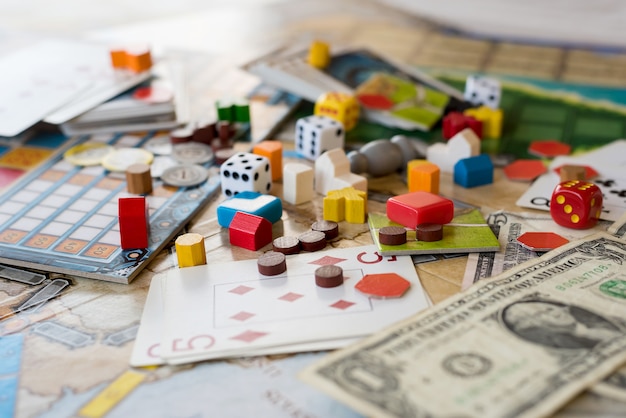 Board games, coins, bills, dice and cards