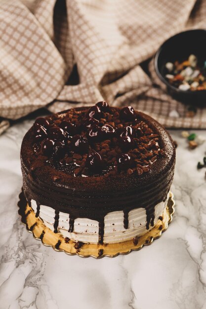 Board with delicious cake on table