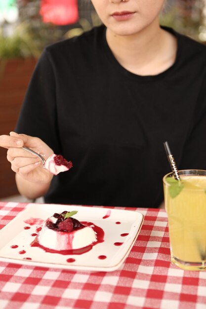 Board with delicious cake on table