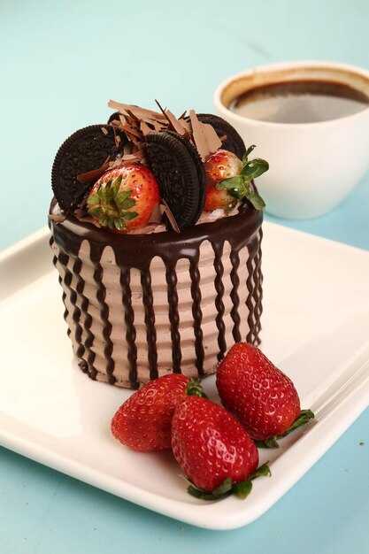 Board with delicious cake on table