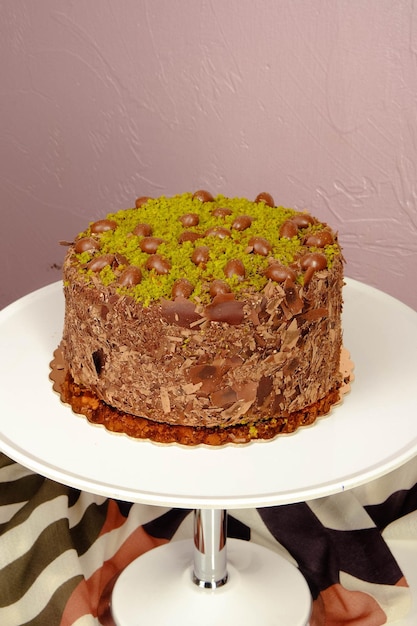 Board with delicious cake on table