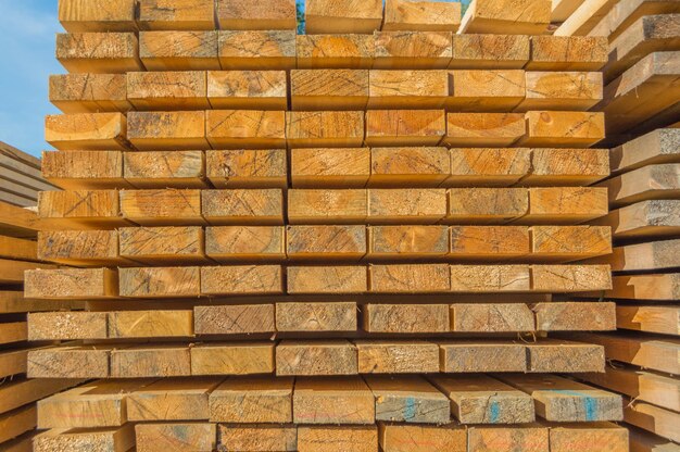 Boards for building, stacked on the street.