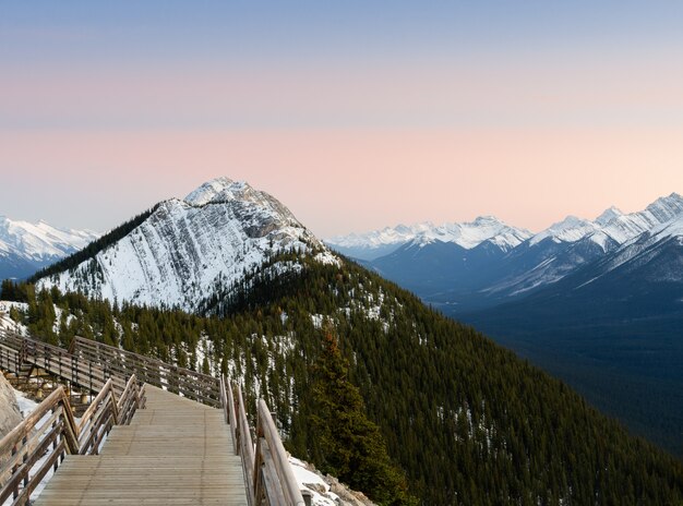 Boardwalk on Sulphur Mountain connecting Gondola landing at sunset in Banff, Canada.  Gondola ride to Sulphur Moutain overlooks the Bow Valley and the town of Banff.
