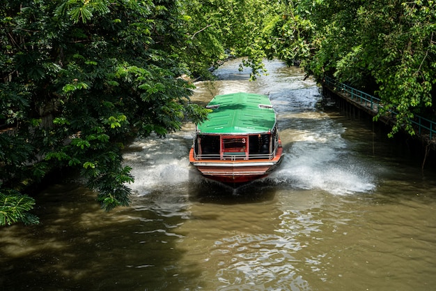 Boat on a Bangkok River. river in Bangkok