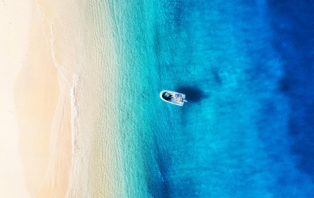 Boat and coast from top view Turquoise water background from drone Summer seascape from air Travel image