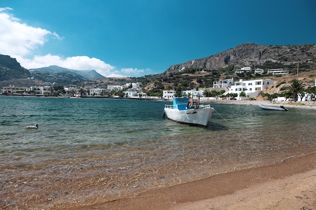 Boat in Kapsali bay, Kithira island, Greece.