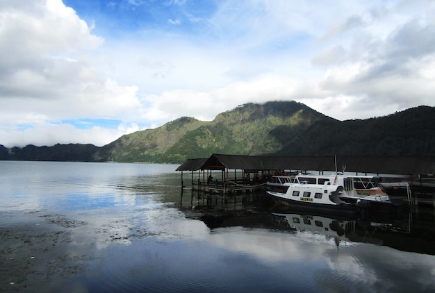 Boat on the Lake with Mountain in Background