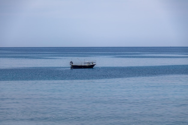 A boat in a Mediterranean beach of Ionian Sea Bova Marina Calabria Italy