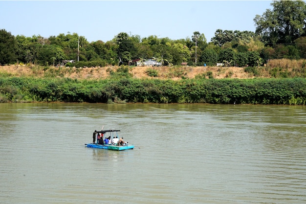 Boat transport people crossing the river