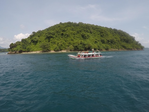 A boat in the water with the word island pahawang on it