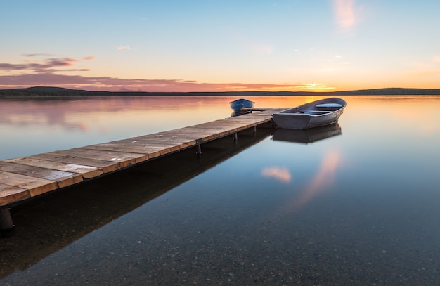 Boats at the pier on the lake