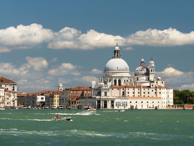 boats sailing in grand canal against sky