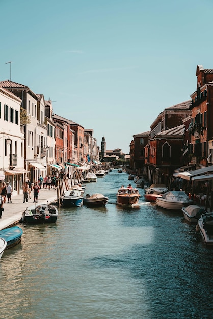 boats sailing in grand canal against sky