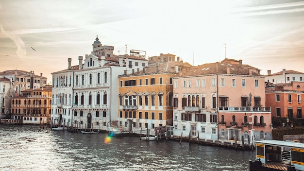 boats sailing in grand canal against sky