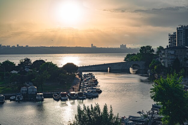 Boats and sunset in the lake marina