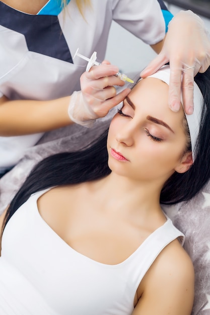 Body Care. Cute girl receiving hyaluronic acid treatment