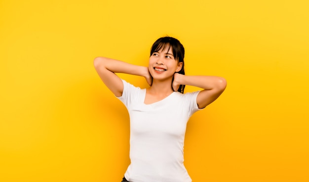 Body relaxation calm and tired asian woman attractive face A quiet woman holds her hands behind her head. relax breathing breath of fresh air and is relaxing