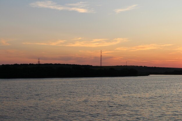 A body of water with a body of water and a sunset